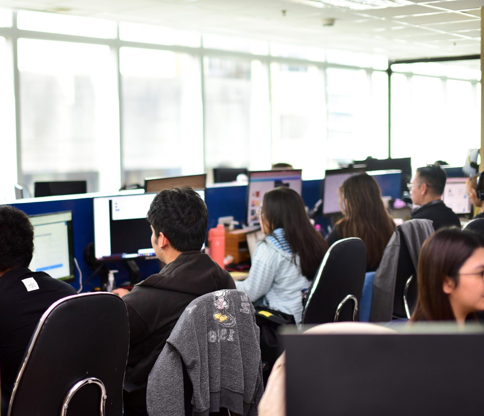 Ad On Group staff working at computers in the open-plan office
