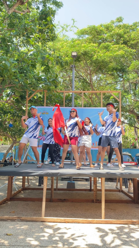 Staff in team colours at the annual team-building day