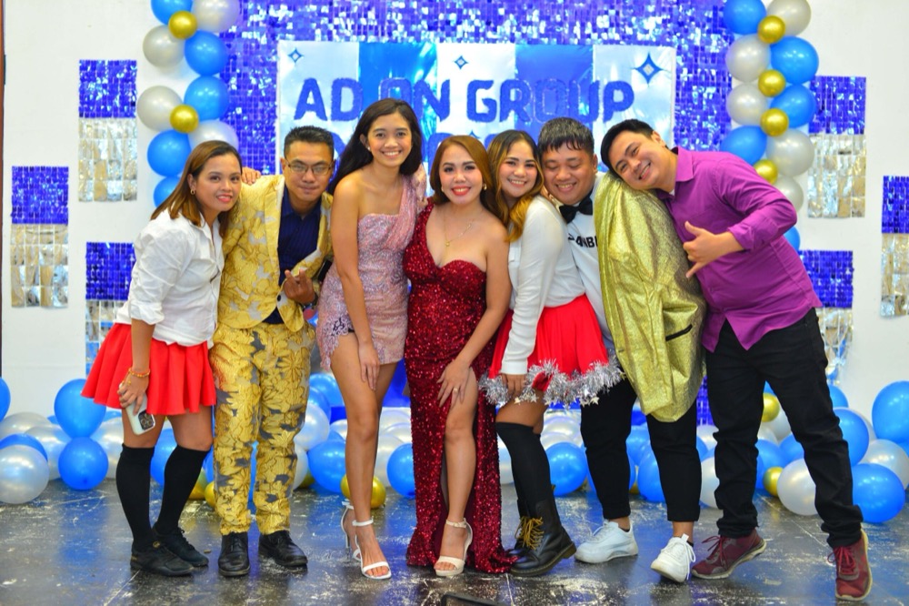 Staff in formal dress at the Ad On Group annual party