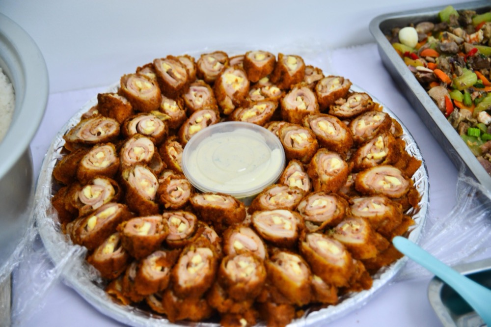 Team gathered around a table over a shared meal